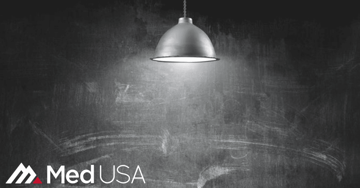 image of chalkboard and hanging light with EHR electronic health records Med USA logo