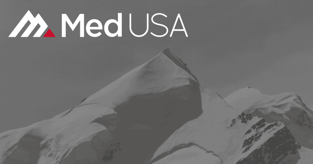 faded black and white mountain with snow with red and white med usa logo