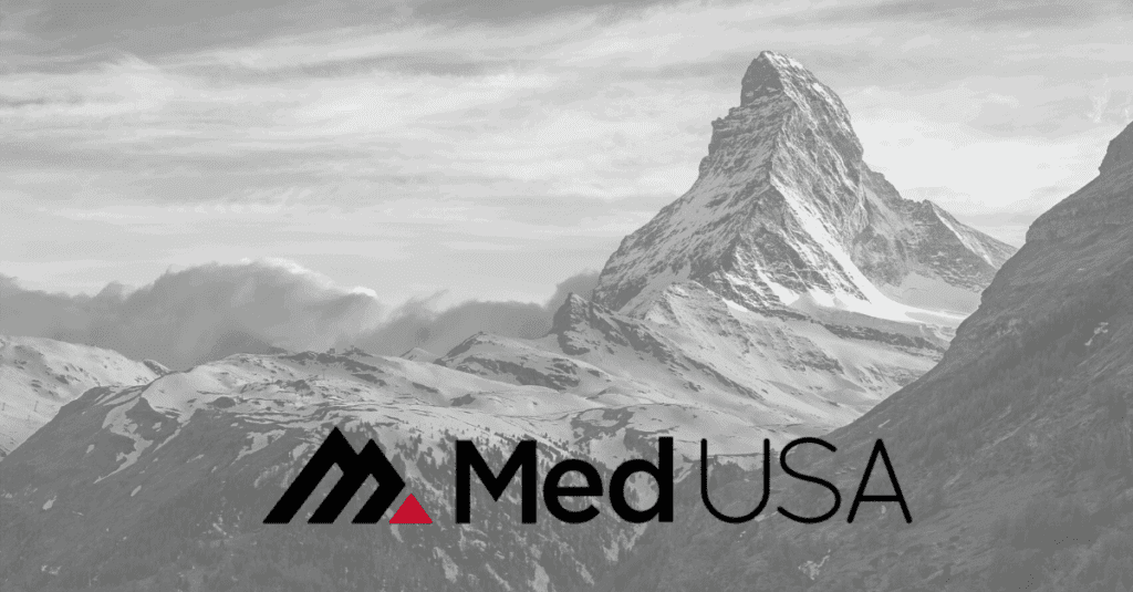 faded image of snowy mountain top with black and red med usa logo