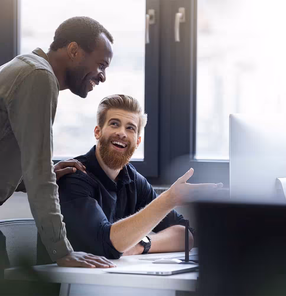Two healthcare administrators discussing a project at work