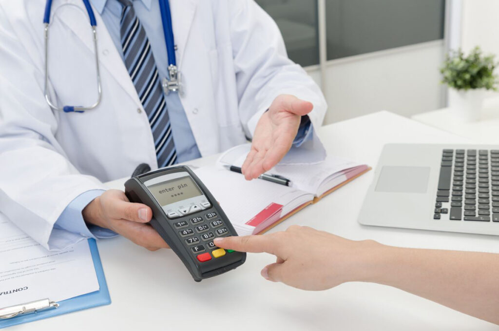 An urgent care physician analyzing billing data