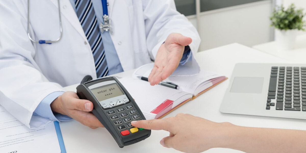 An urgent care physician analyzing billing data