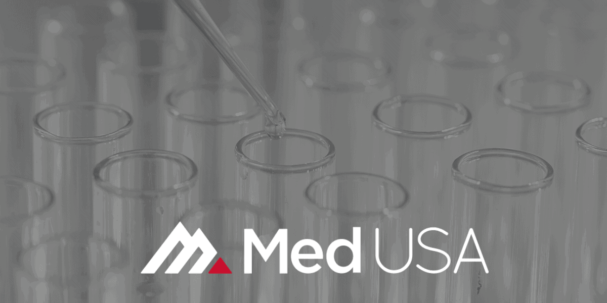 faded black and white background of beakers in a lab for lab billing with white and red med usa logo