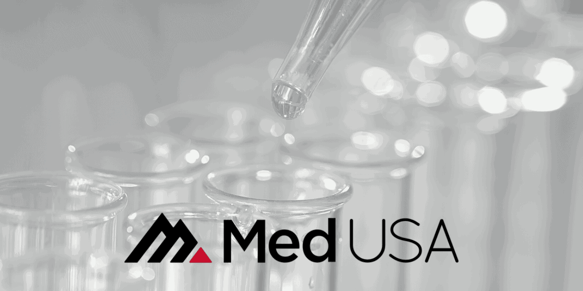 water being dropped into beaker for lab billing services with red and black med usa logo